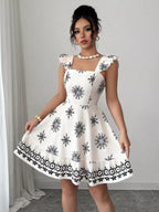 Printed bow back square neck mini dress by Shopimist, featuring a stylish design with a bow detail and square neckline.