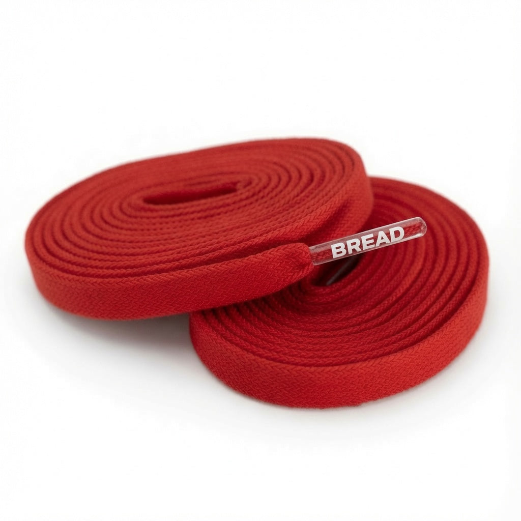 Bright red elastic shoelace from Plush Fashion Hub, showing flexible, stretchable design for easy slip-on sneakers.