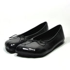 Glossy black ballet flat loafers with a rounded toe, slip-on style, and a delicate tie detail at the top.