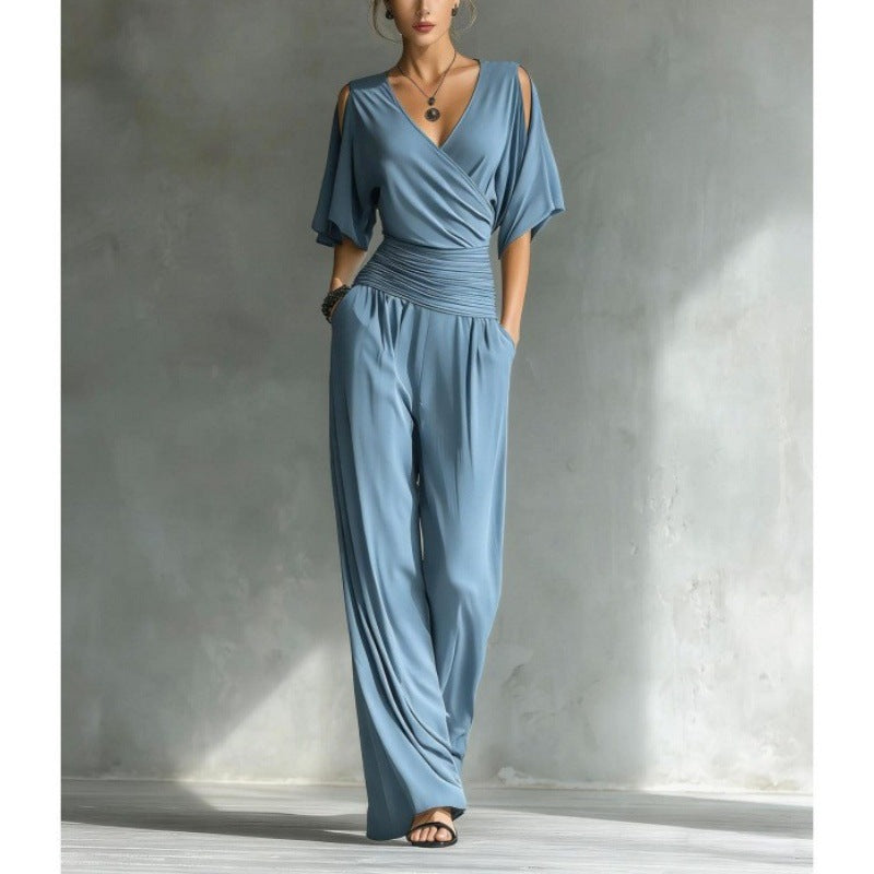 Women's V-neck slim fit straight leg jumpsuit by Plush Fashion Hub, featuring a sleek V-neck design and tailored fit.