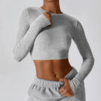 Women’s slim fit long sleeve yoga top by Plush Fashion Hub, made of stretchy activewear fabric, shown on a mannequin.