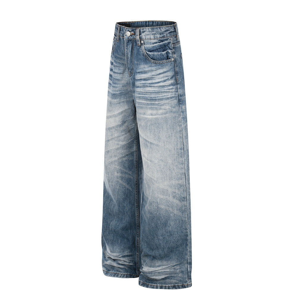 High-rise, wide-leg denim jeans in a medium-blue gradient washed finish with classic five-pocket styling.