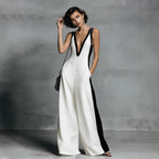 Women's color-block sleeveless V-neck jumpsuit with wide-leg pants, casualwear by Plush Fashion Hub, featuring a stylish French-inspired design.