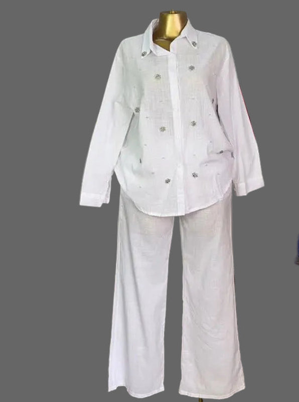 Beaded long sleeve top and high-waist pant set by Plush Fashion Hub, stylish and elegant women's fashion ensemble.