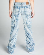 AJ18SK EXTREME FRAYED STACKED JEANS - Plush Fashion Hub