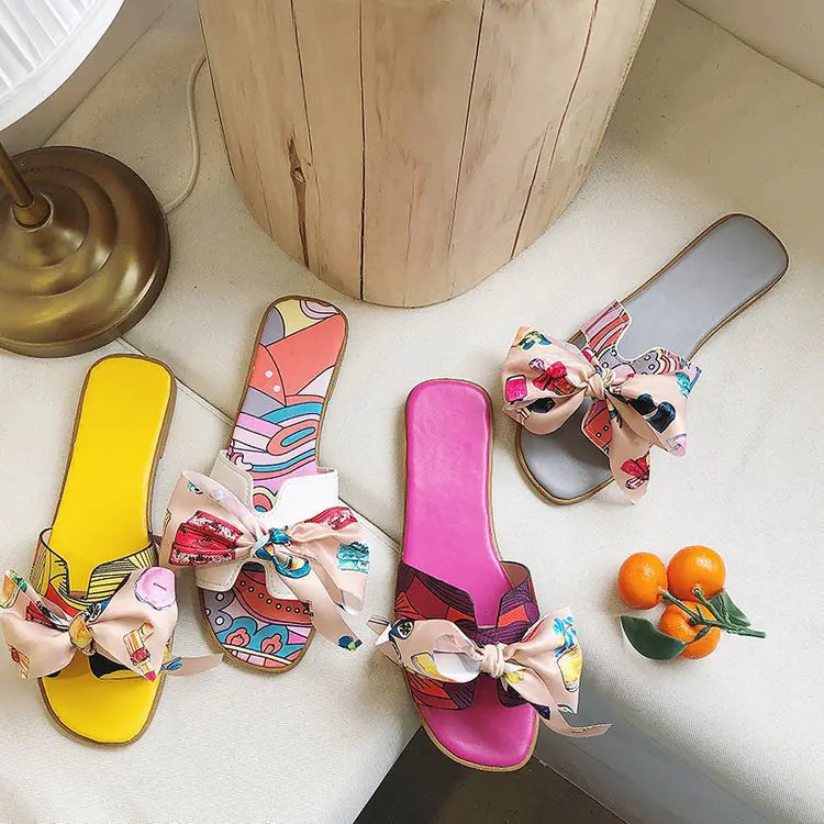 Women's summer flat slippers with bow detail, trendy women's sandals by Trendy Attic Store01, casual and stylish footwear.