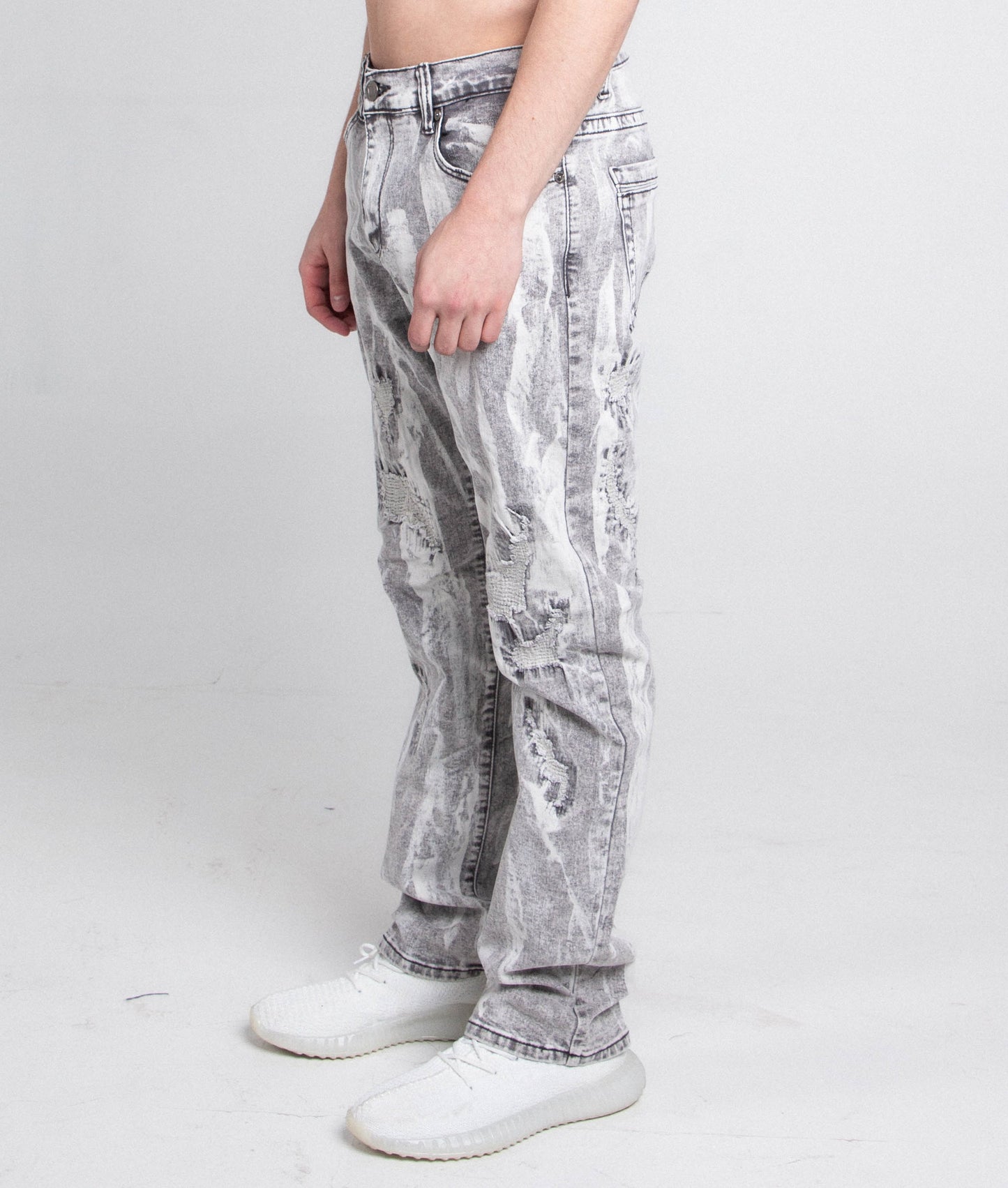 Grey and white vintage slim jeans by Plush Fashion Hub, showing the fitted design and classic denim texture.