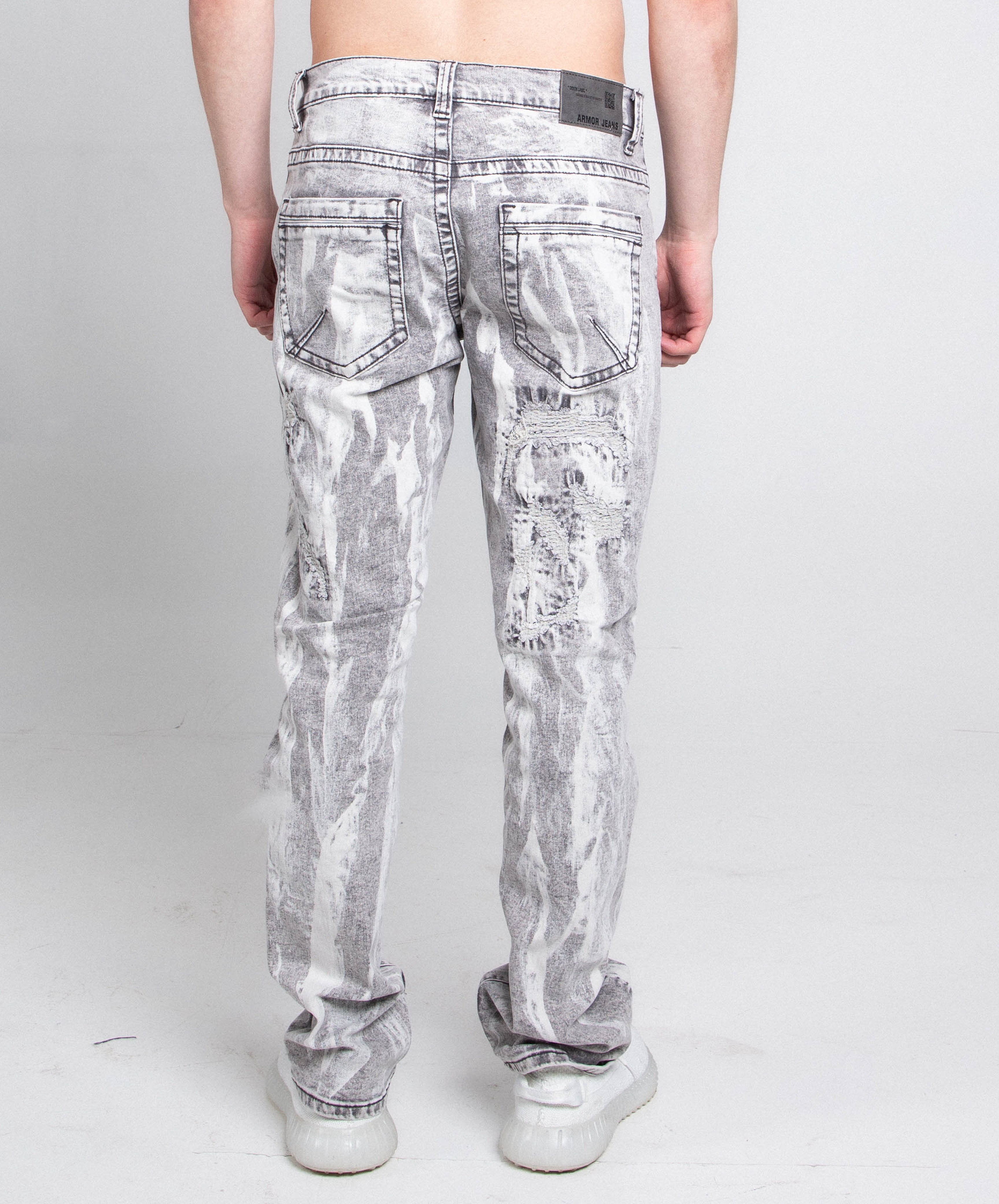 Gray and white vintage slim jeans by Armor Jeans, featuring a classic design with a fitted silhouette and detailed stitching.