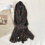 Women's vintage floral cotton linen scarf with retro print, soft and breathable wrap for stylish, feminine accessory.