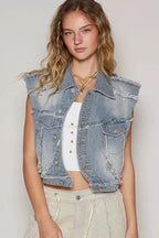 Asymmetrical distressed denim vest with raw hem, sleeveless jean jacket by Trendsi, showcasing rugged, edgy style and raw hem detail.
