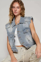 Asymmetrical distressed denim vest with raw hem, sleeveless jean jacket by Trendsi, featuring rugged, fashionable design.