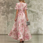 Women's deep V-neck ruffle sleeve printed maxi dress by FitiqueFit, featuring a high waist and flowing fabric.