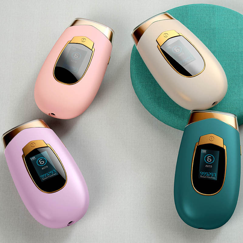 Four handheld IPL hair removal devices in pink, light purple, beige, and dark green, with gold trim and digital displays.