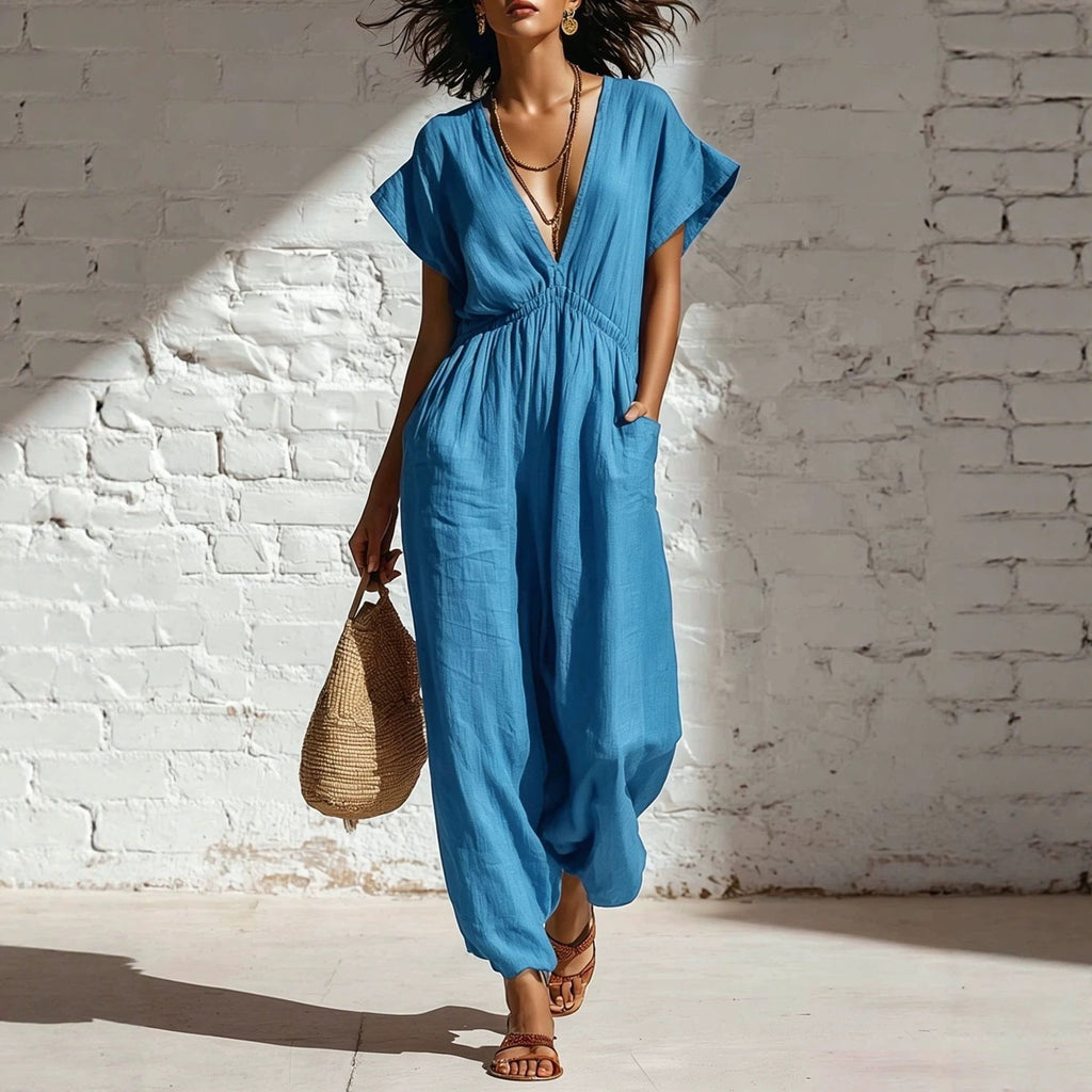Women's deep V-neck three-quarter sleeve high waist wide-leg pants by FitiqueFit, shown in a stylish, flowing fabric.
