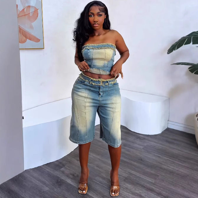Women's denim fashion set with raw hem crop top and high-waisted shorts from Plush Fashion Hub, shown on a model.