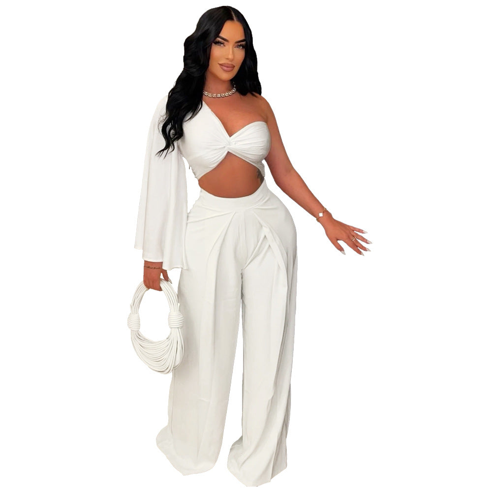 Asymmetrical pleated one-shoulder top with matching trousers from eprolo, stylish and modern women's clothing ensemble.