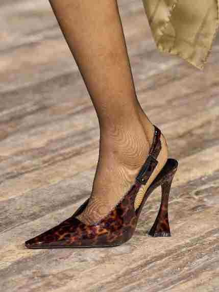 Black pointed toe patent leather stiletto pumps from Plush Fashion Hub, showcasing sleek heels and glossy finish.