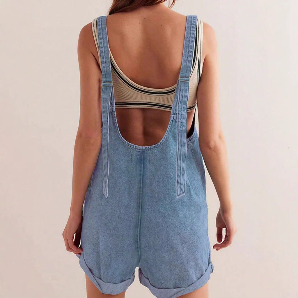 Women's loose denim overall shorts by FitiqueFit, featuring a relaxed fit and bib design, perfect for summer streetwear.