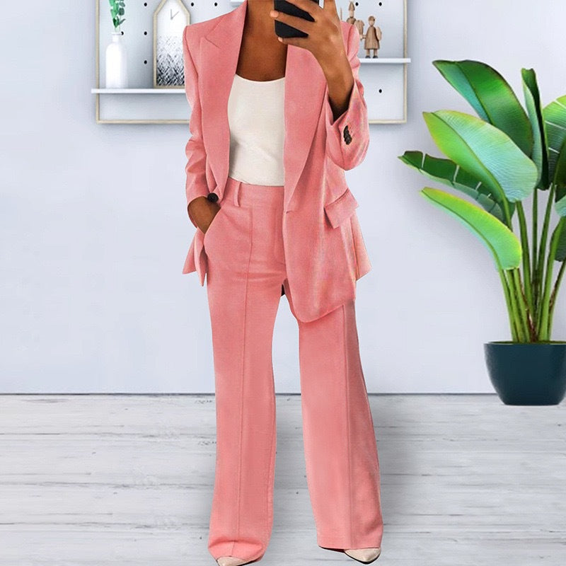 Slim fit blazer with notched collar from Plush Fashion Hub, showcasing tailored outerwear with sleek design and structured fit.