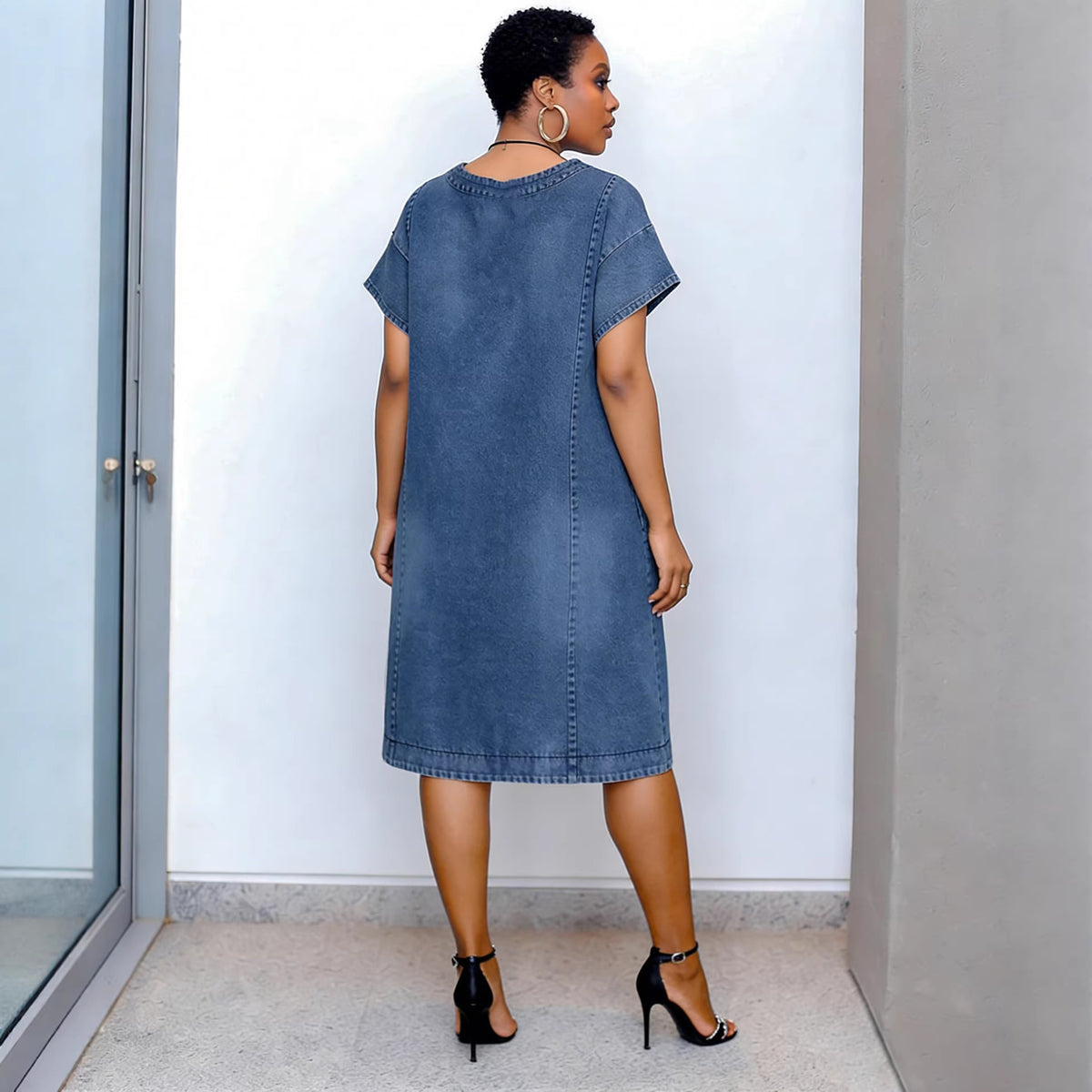 Casual eprolo denim dress with shoulder sleeves, short length, split design, and rounded hem, perfect for everyday wear.