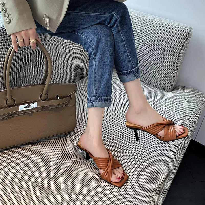Elegant square-toe stiletto heels with crisscross straps from Plush Fashion Hub, showcasing a stylish and sophisticated footwear design.