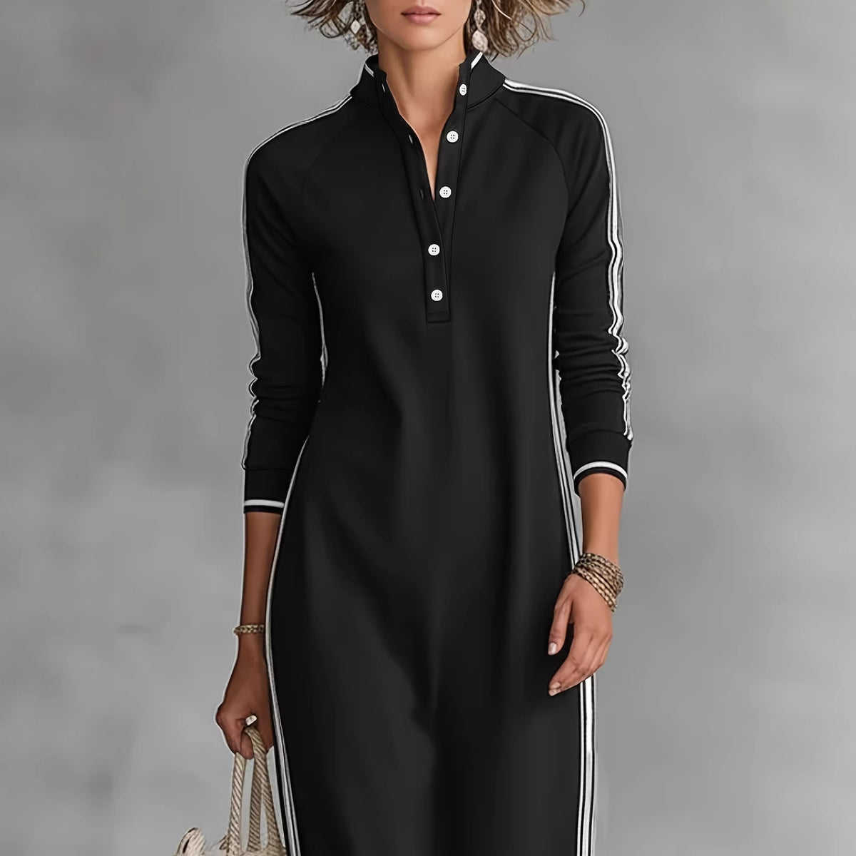 White long skirt dress by eprolo featuring a simple design with a button neck, rolled edges, and a casual hoodie style.