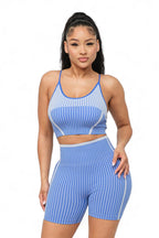 Seamless striped activewear set with fitted top and biker shorts from The House of Stylez, ideal for workout or casual wear.