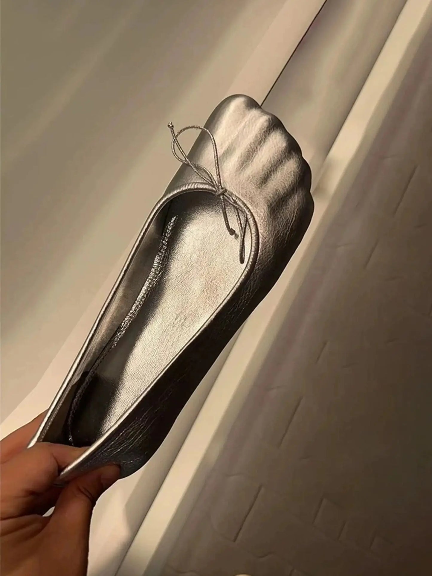 Black and silver round toe slip-on loafers by Plush Fashion Hub, stylish and comfortable footwear for casual or formal wear.