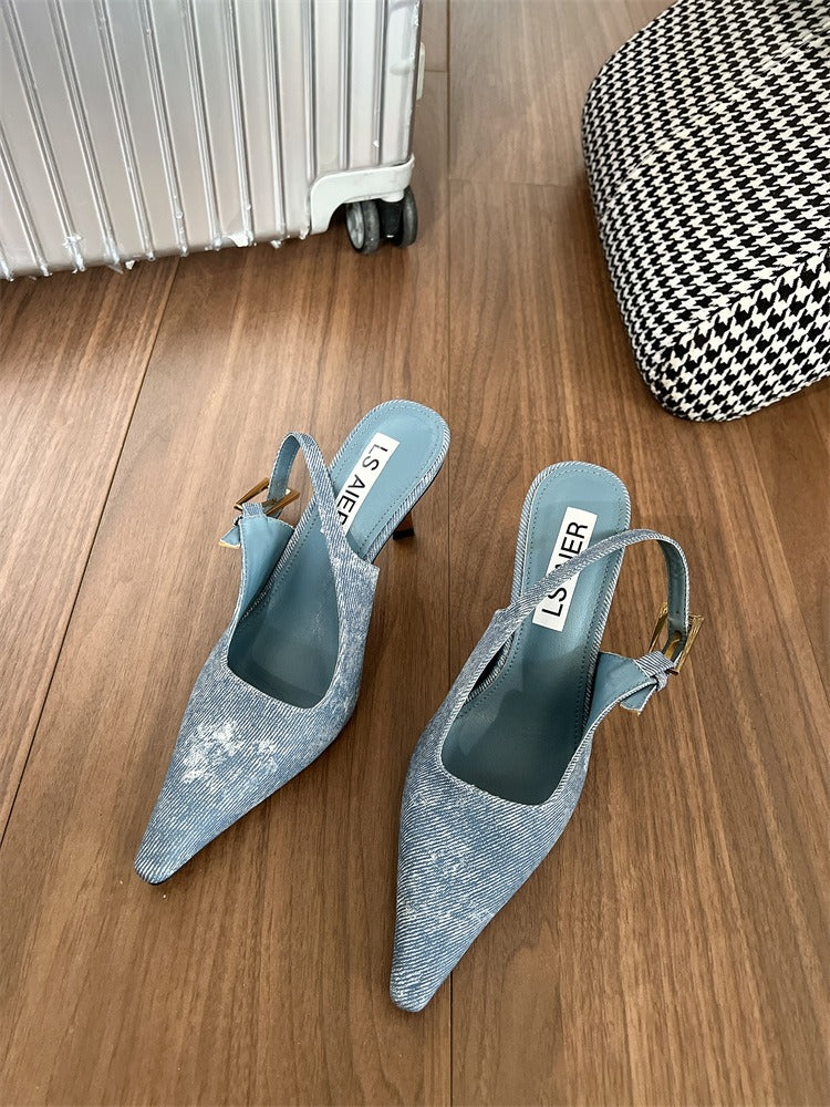 Light blue denim pointed-toe slingback heels with buckled straps, stiletto heels, and branded insoles.