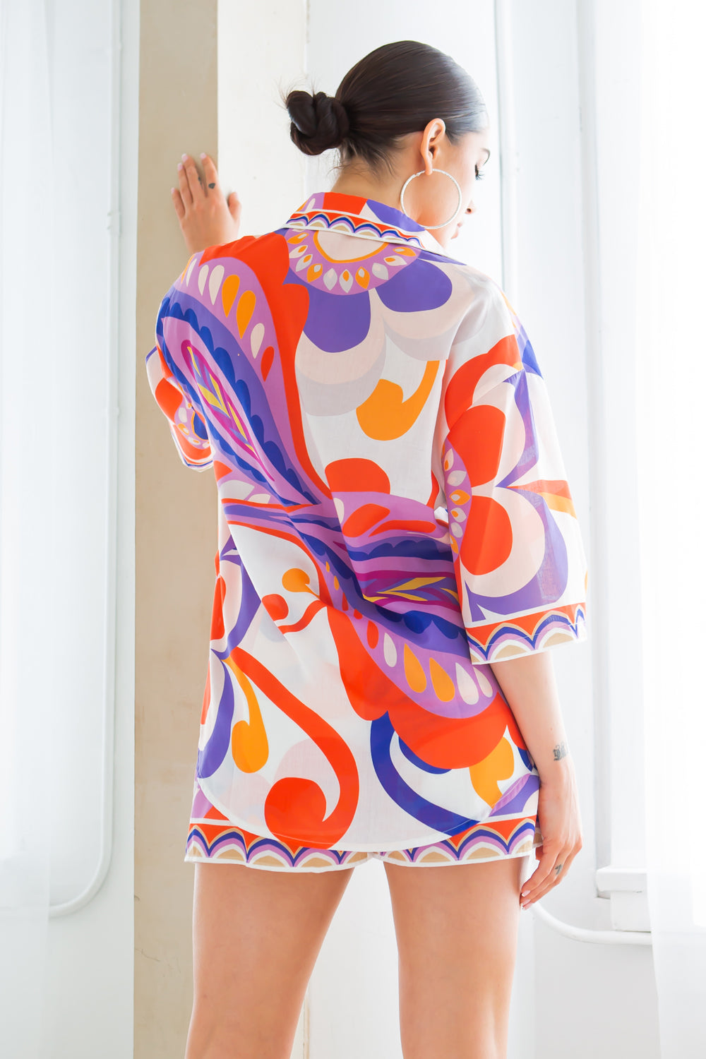 Plush Fashion Hub Joanna orange short set featuring a stylish, comfortable matching top and shorts ensemble.