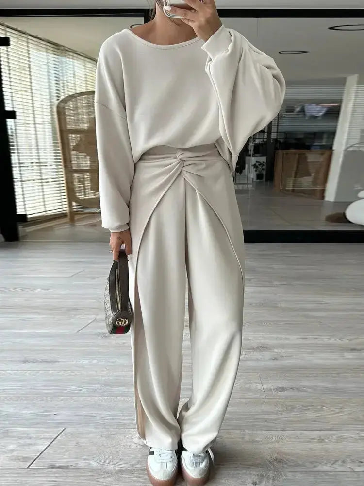 Women's backless solid-color hoodie and jogger lounge set by Plush Fashion Hub, featuring a relaxed fit and casual activewear style.