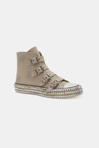 Beast multi-buckle studded platform sneakers with edgy punk style, featuring multiple straps and a chunky sole for a bold look.
