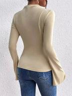 Plush Fashion Hub mock neck fitted top with ruched detail and bell sleeves, stylish and comfortable women’s blouse.