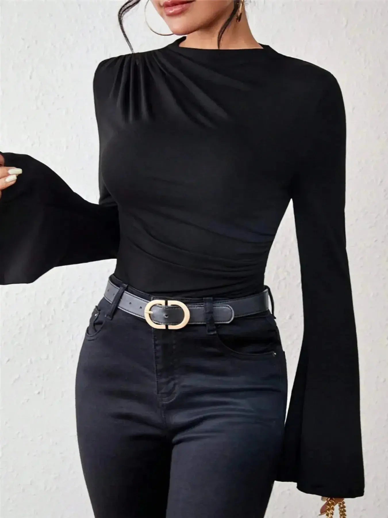 Plush Fashion Hub mock neck fitted top with ruched details and bell sleeves, stylish and comfortable for everyday wear.