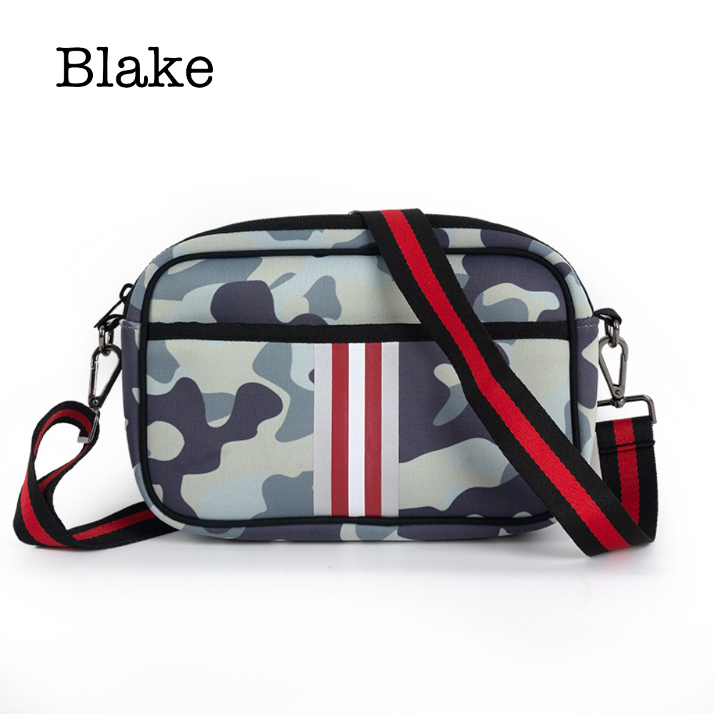 Black neoprene crossbody bag by Threaded Pear featuring adjustable strap and minimalist design for everyday use.