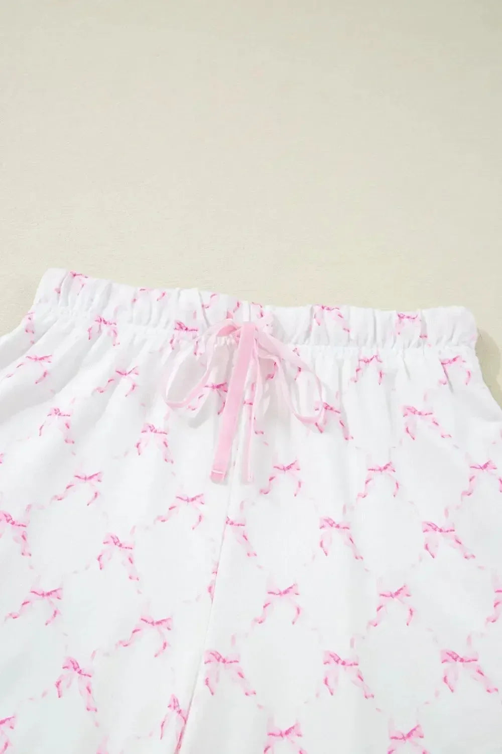 Bow Print Lettuce Trim Round Neck Top and Shorts Lounge Set - Plush Fashion Hub