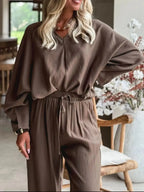 Plush Fashion Hub braided V-neck long sleeve top with high-waist pants lounge set, comfortable casual wear for relaxing or lounging.