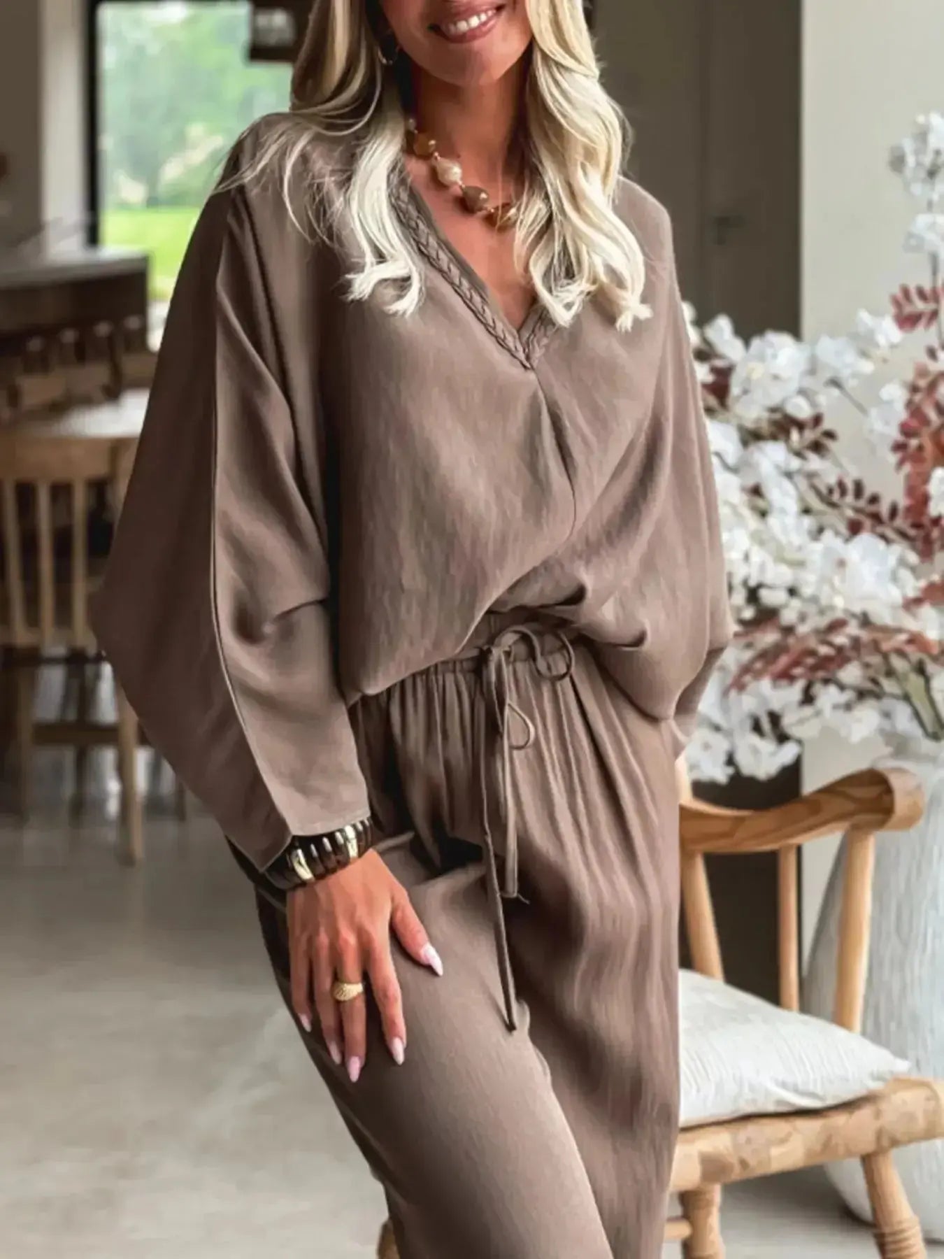 Plush Fashion Hub braided V-neck long sleeve top and high-waist pants lounge set, stylish and comfortable for casual wear.