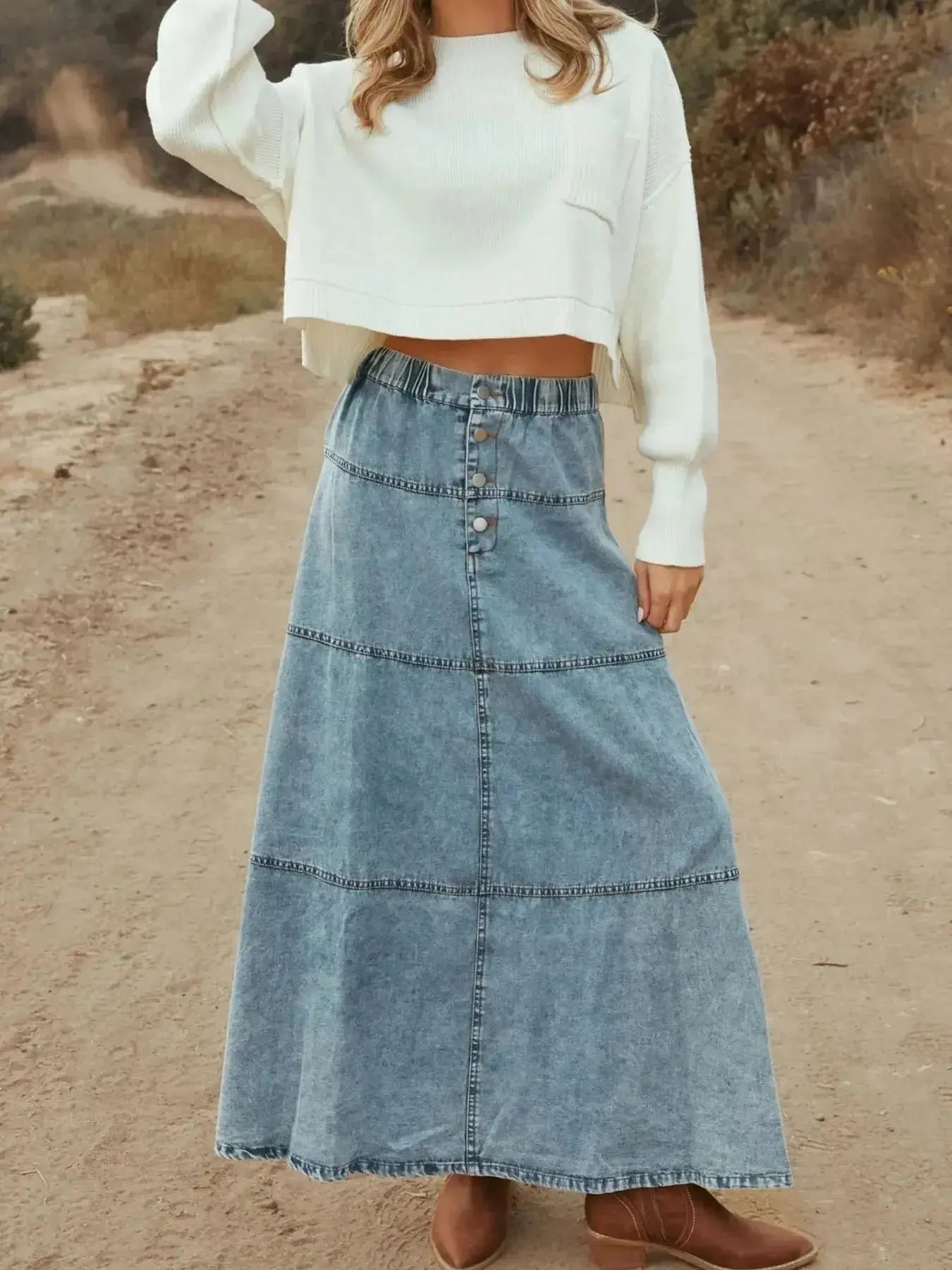 Flowy casual long denim maxi skirt with button-front tiers by Trendsi, featuring a relaxed, flowing silhouette and casual style.