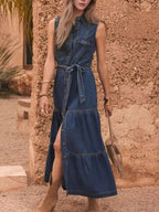 Sleeveless denim dress with button front and tiered design, featuring a belt for a stylish look from Trendsi.