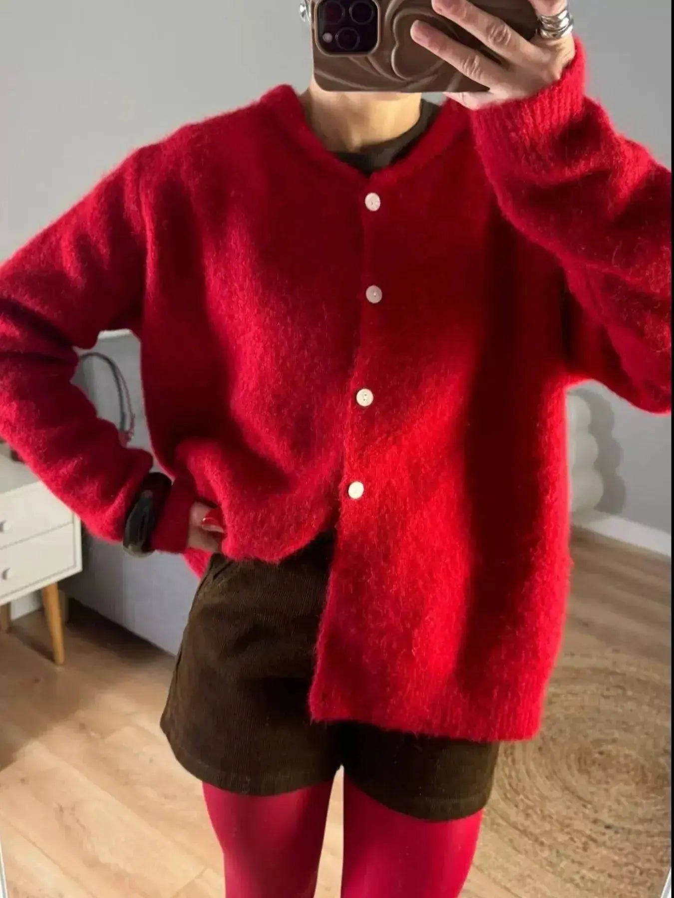 Soft knit long sleeve button-up cardigan by Plush Fashion Hub, featuring a classic, cozy layering sweater in neutral tones.