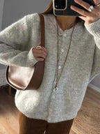 Soft knit Plush Fashion Hub long sleeve button-up cardigan, cozy layering sweater with classic design and front buttons.