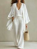 Women's 3-piece cardigan, sleeveless vest, and wide-leg pants set by FitiqueFit, styled together in a coordinated outfit.