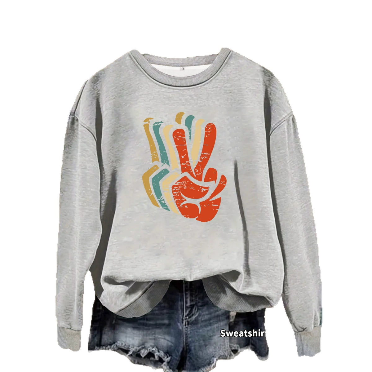 Gray sweatshirt with long sleeves and a crew neck, featuring a distressed retro peace sign graphic in orange, blue, and yellow.