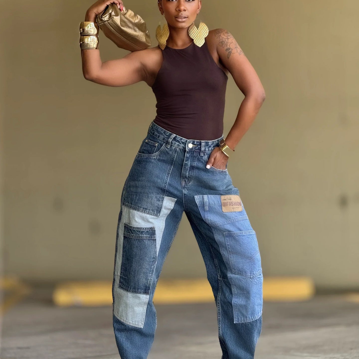 Deconstructed patchwork multi-pocket tapered denim jeans by Plush Fashion Hub featuring unique design details and varied fabric patches.