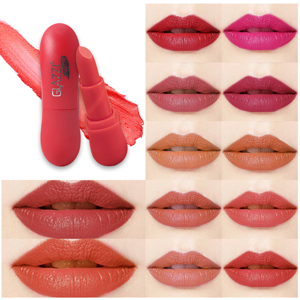 Pink matte lipstick in a round plastic case, with swatches and twelve lips wearing different shades.