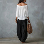 Women's one-shoulder T-shirt and wide-leg pants two-piece set by FitiqueFit, casual urban outfit, front view showing stylish design