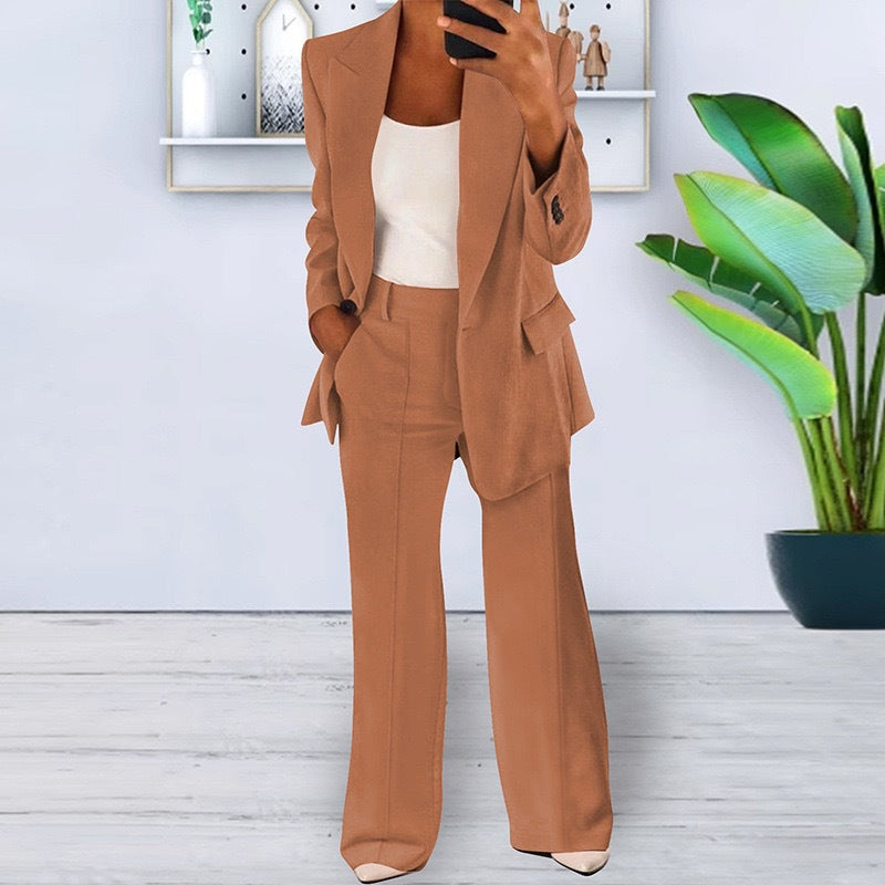Slim fit blazer with notched collar from Plush Fashion Hub, stylish outerwear in a sophisticated design, shown on a mannequin.