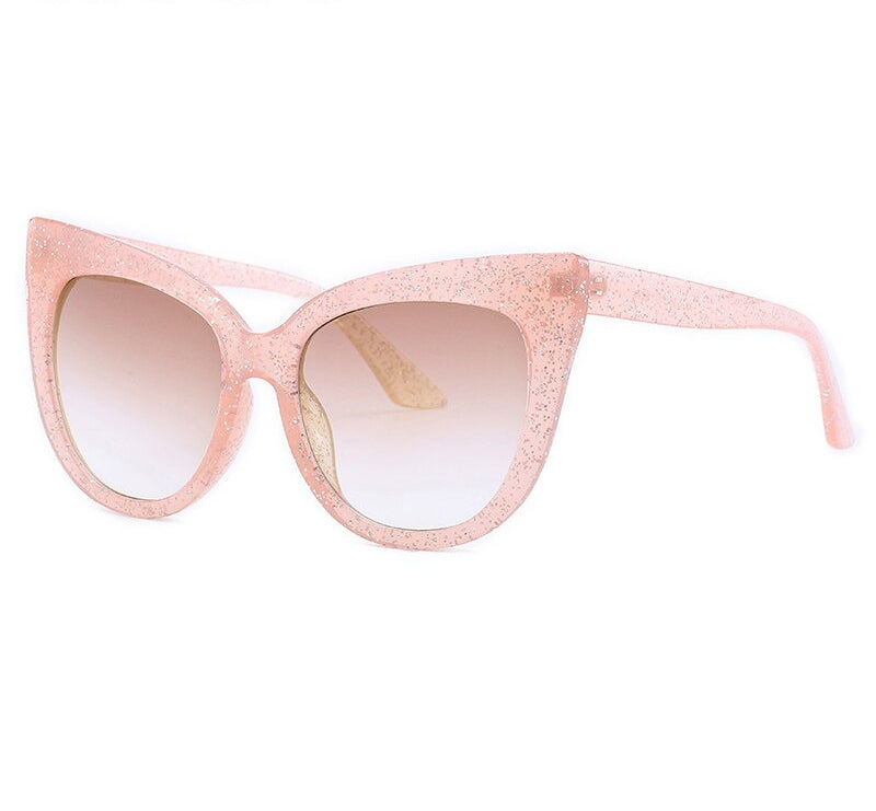 Women's oversized cat eye sunglasses from Plush Fashion Hub with UV400 protection, stylish black frames and tinted lenses.