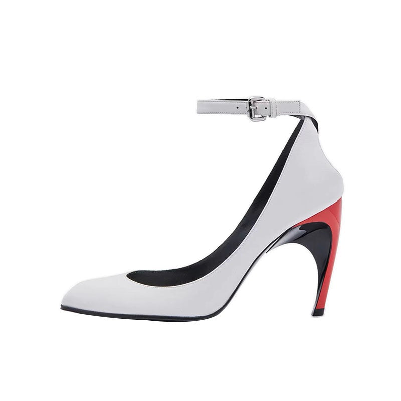 Colorblock pointed-toe stiletto heels by Plush Fashion Hub featuring buckle detail and modern design.